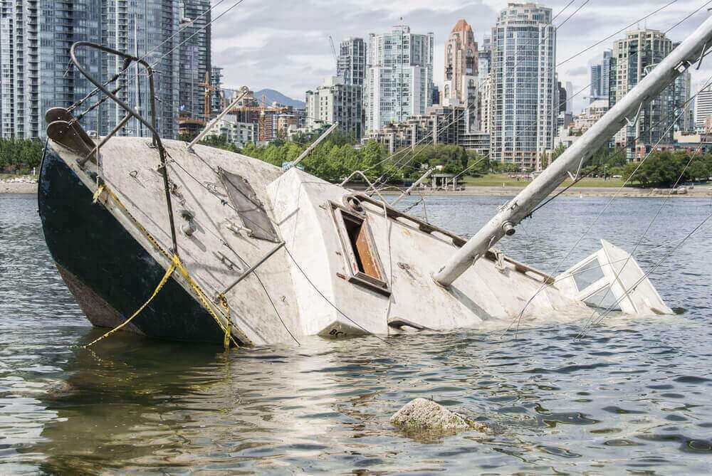 Boat slowly sinking due to mechanical malfunction.