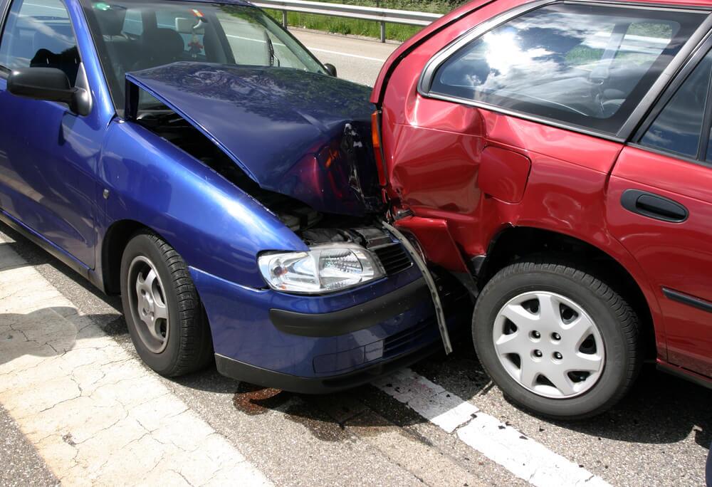 Two car collision in the highway.